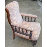 A pale pink ground upholstered Victorian nursing chair