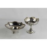A silver bon bon dish, with embossed edge and three feet, and a silver pedestal dish with pierced