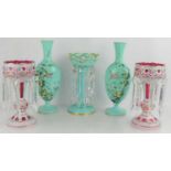 A pair of Victorian pink mantle lustre vases decorated with flowers together with a green lustre