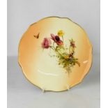 A Royal Worcester plate painted with flowers, butterflies and moths, by Edward Raby, circa 1904,