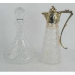 A cut glass claret jug with silver plated mounts, the top and angular handle decorated throughout in