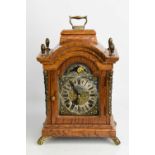 A Warmink Wuba oak and brass mantle clock with acorn finials, eight day movement, moon phase and