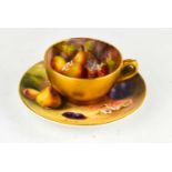 A Royal Worcester miniature cup and saucer, the cup painted with fruit by H. Martin, the saucer by