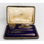 An Edwardian silver manicure set, Birmingham 1910, in the original case.