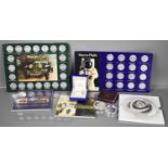 A group of commemorative coins and crowns, including two End of WWII 60th Anniversary £5, a Diana