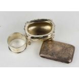 A silver vesta case, engraved with scrollwork, a silver salt, and a silver napkin ring, 3.5toz.