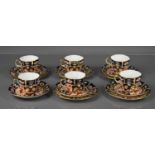 A set of six Royal Crown Derby Imari pattern cups and saucers, together with five cake plates, no