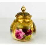 A Royal Worcester vase and cover, painted to the body with roses, and having a pierced cover,