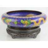 A early 20th century Chinese cloisonne bowl depicting dragons30cm diameter