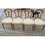 A set of four bedroom chairs with upholstered seats