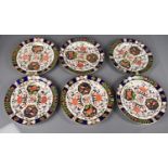 Twelve Royal Crown Derby plates, six 26cm diameter, six 22cm diameter, in the old imari pattern,