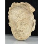 A rare Gandhara carved stone head, circa 2000BC 16cm high.