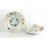 A 20th century Meissen bowl and matching plate, with pierced lattice worked borders, and green
