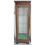 A 20th century oak display cabinet, with glass shelves and interior light.