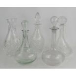 A Royal Brierley vase, together with four various decanters, all with stoppers. (5)