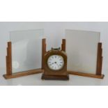 A pair of Art Deco wooden picture frames on a rectangle base together with a French mantle clock