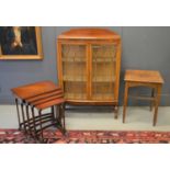 A 1940s oak display cabinet together with a nest of four tables and a oak occasional table135cm by