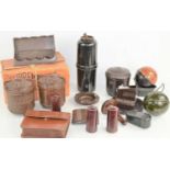 A group of vintage bakelite items to include tobacco canister, tea and coffee canisters, shaving