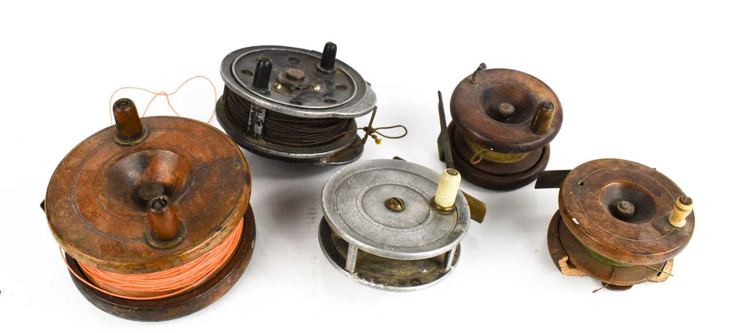 Three wooden antique fishing reels, together with two steel examples; one by Wesley & Co of