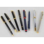 A group of vintage pens to include three Waterman examples