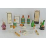 A group of vintage perfumes to include Chanel No5 together with perfume atomizers and other items