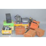 A group of vintage cameras and equipment to include a Westbury contact printer, Kodak Brownie,