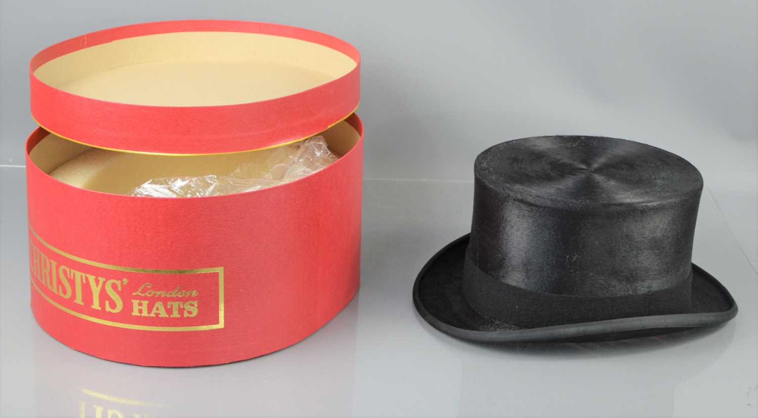 A 20th century Christy's of London black top hat, with the original box and tags, 7 5/8, 62cm