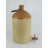 An early 20th century A.J Caley & Son Ltd stoneware beverage dispenser, two gallon.45cm high