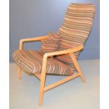 A Mid-Century Danish Fritz Hansen lounge chair upholstered in striped fabric