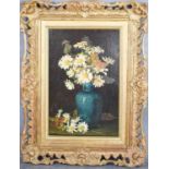 An early 20th century oil on board depicting still life of daisies, unsigned, 37 by 24cm.