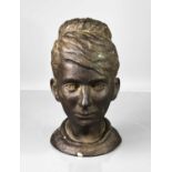 F. Humpfries (20th century): clay sculpture of a female head, dark brown / black matt glaze, signed.