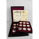 A Queen Elizabeth II 40th Anniversary Coronation Crown Collection, full set of 18 silver