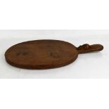 Robert Thompson 'Mouseman' oak cheese board, with signature carved mouse to the handle.