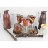 A group of vintage bakelite items to include two Thermos flasks, three Jubilee creamers, tray and