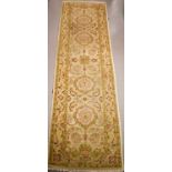 A cream ground wool runner