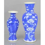 Two late 19th / early 20th century Chinese blue and white baluster shaped vase with prunus