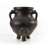 A rare Chinese stoneware three handled jar / censor, with dark brown glaze, each handle modelled