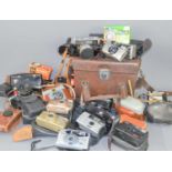 A group of vintage cameras to include Praktica Nova, Agfa, Purma Special, Ilford Sportsman, Canon