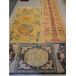 Two woollen rugs together with cream ground woollen runner with stylised borders.272cm by 72cm