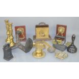 A quantity of brass and metal ware to include candlesticks, inkwell, horse brasses, lion head