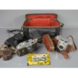 A Zorki 4K vintage 35mm camera together with a Balda super Baldina camera and case
