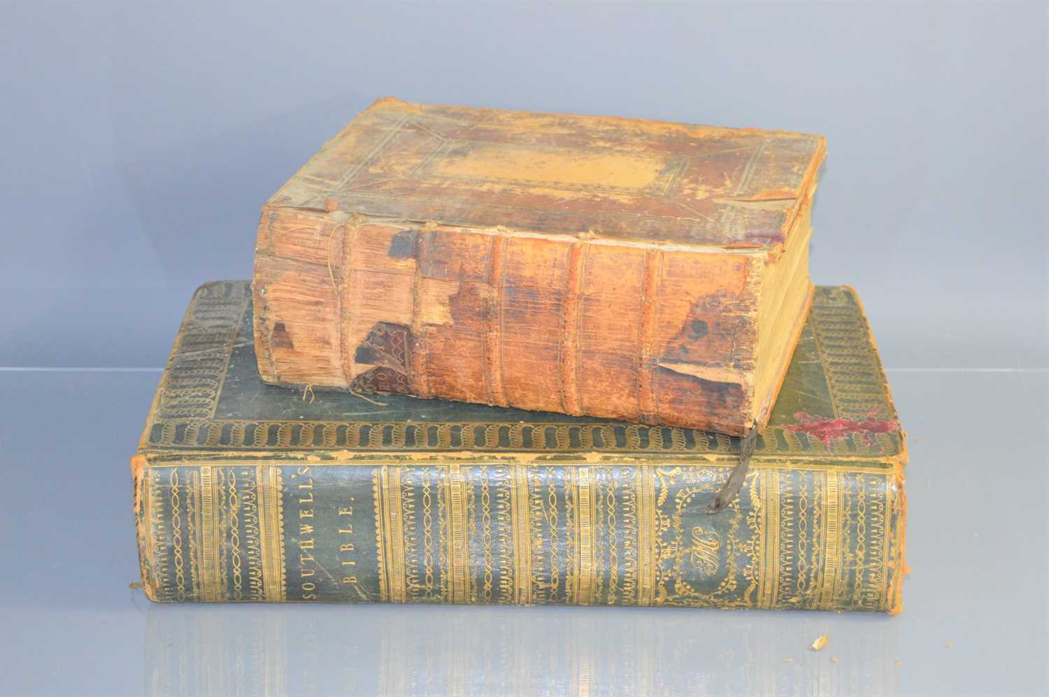 Two 18th century bibles, Southwells family bible 1777 and the book of common prayer printed by