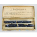 A Conway Stewart "Dinkie" 550 pen and pencil set in original box