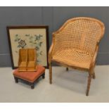 A mahogany and caned armchair with spiral twist legs together with a footstool, tapestry panel and a