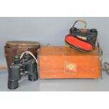 Two pairs of vintage Regent binoculars together with a WWII era first aid box