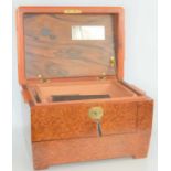 Tobacciana: a fine quality 20th century Amboyna burr wood veneered humidor, with ebony stringing,