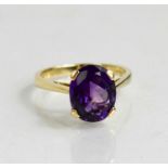 A 9ct gold and amethyst cocktail ring, in a four claw setting, size M, 2.8g.