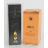 Bells fine old Scotch whiskey aged 12 years and a bottle of Antiquary finest Scotch whiskey aged