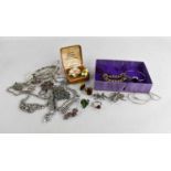 A quantity of costume jewellery to include diamante necklaces, marcasite set brooches, silver rings,