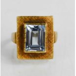 A 14ct gold and emerald cut aquamarine dress ring, stone approximately 11 by 8mm, size Q, 6.62g.